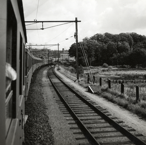 168435 Gezicht op de spoorlijn bij Oosterbeek Laag, vanuit een internationale trein.